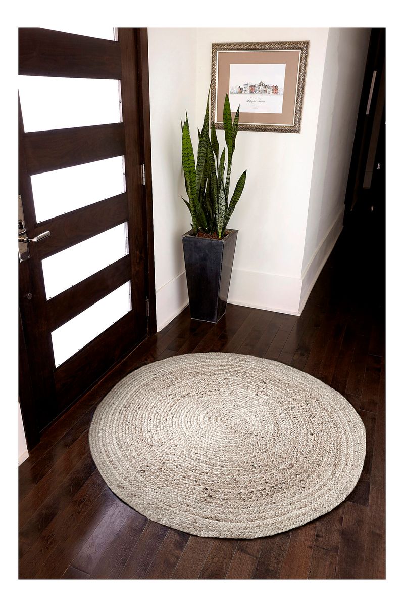 products/9607405/9607405_o02_4ft_round_kerala_ivory_jute_rug